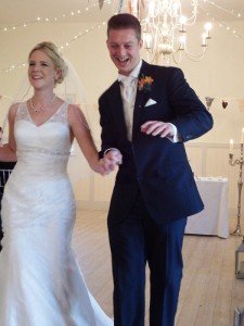 A happy couple at a wedding officiated by Peter Tautz - the Right Toastmaster 